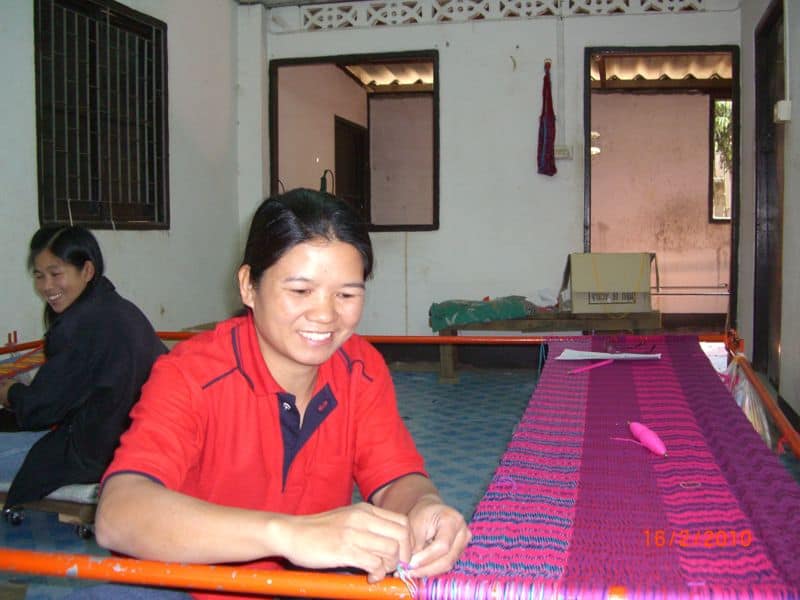 Hill tribe women weaving hammocks by hand